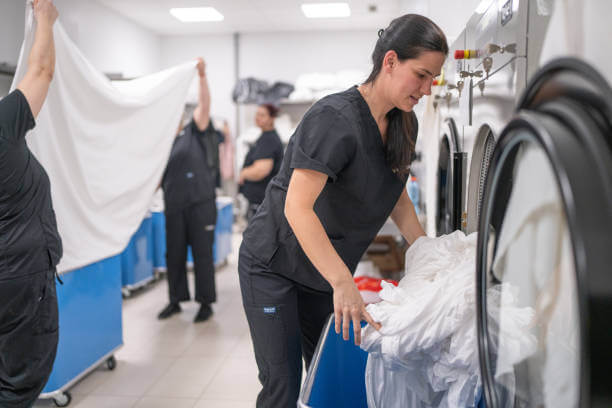 Top 10 Laundry Services Near Me in Dubai: A Local Guide maid doing laundary in uae